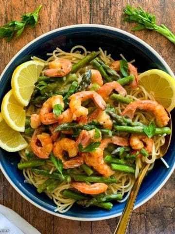 A bowl of lemon garlic shrimp with linguine