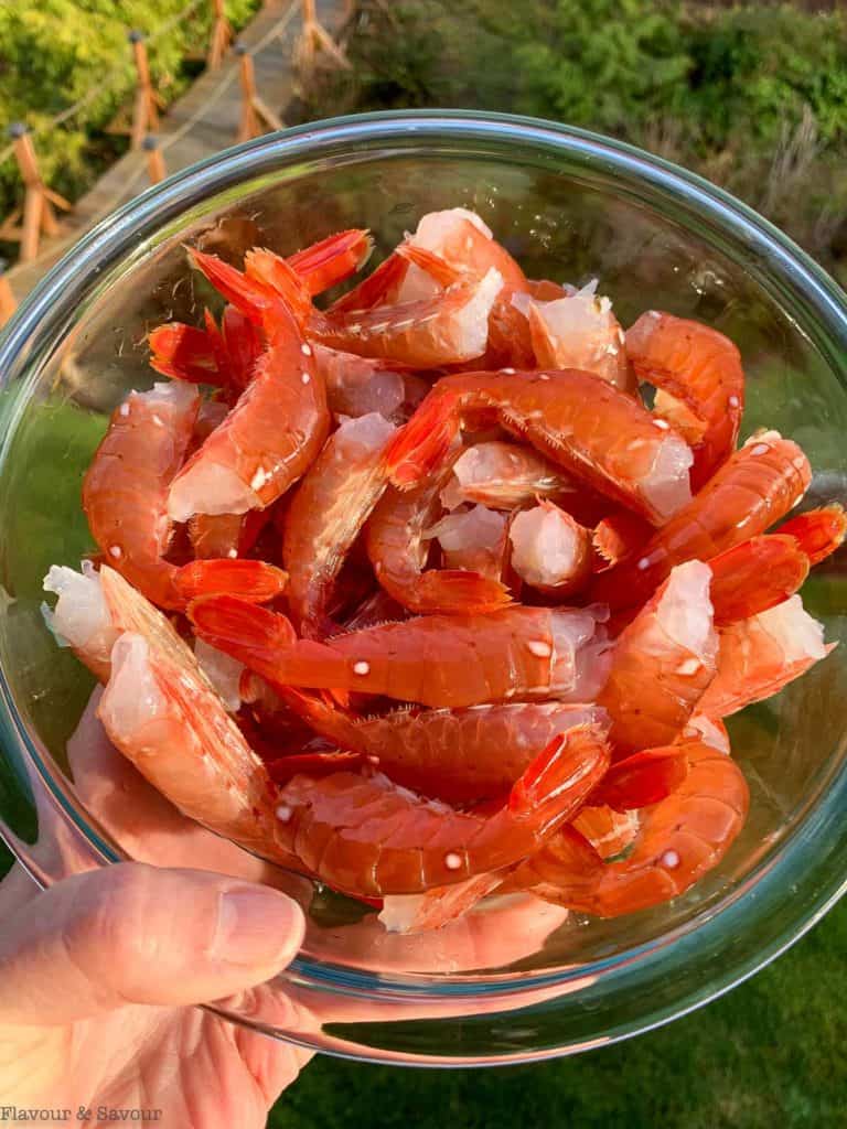 Spot prawn tails in a glass bowl