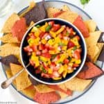 Strawberry mango salsa surrounded by tortilla chips