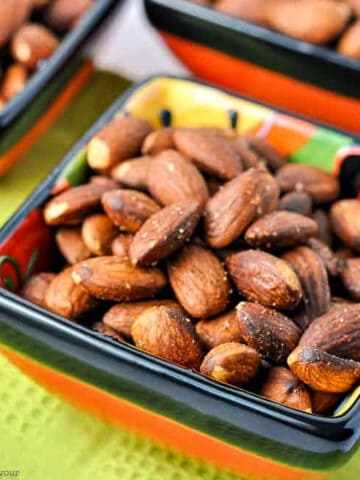 a small square bowl filled with Spanish spiced almonds