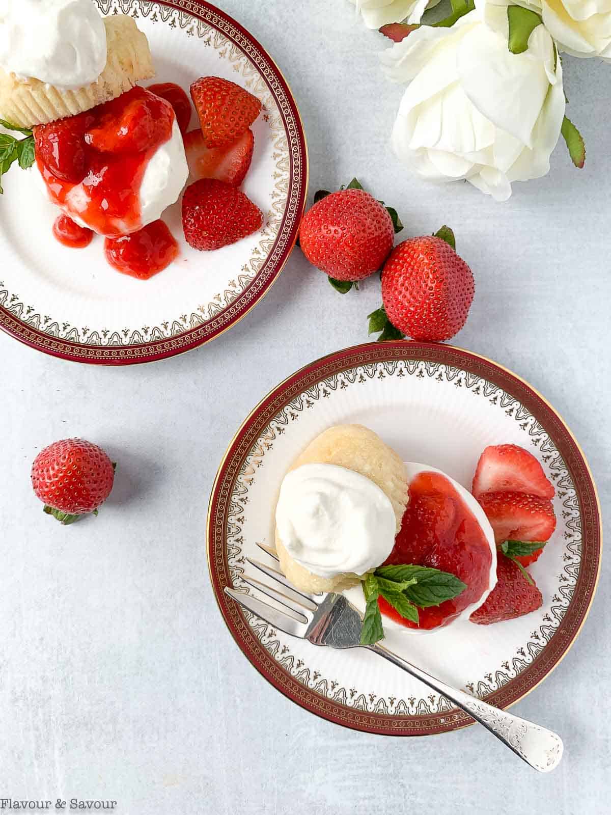 overhead view of gluten-free strawberry shortcakes made with vanilla cupcakes.