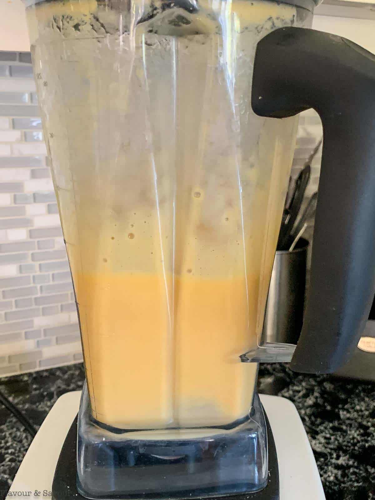 blending peaches in a blender