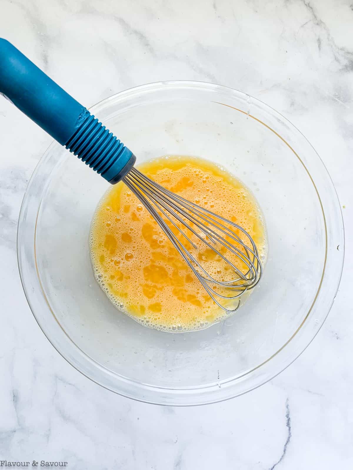 whisking eggs and honey