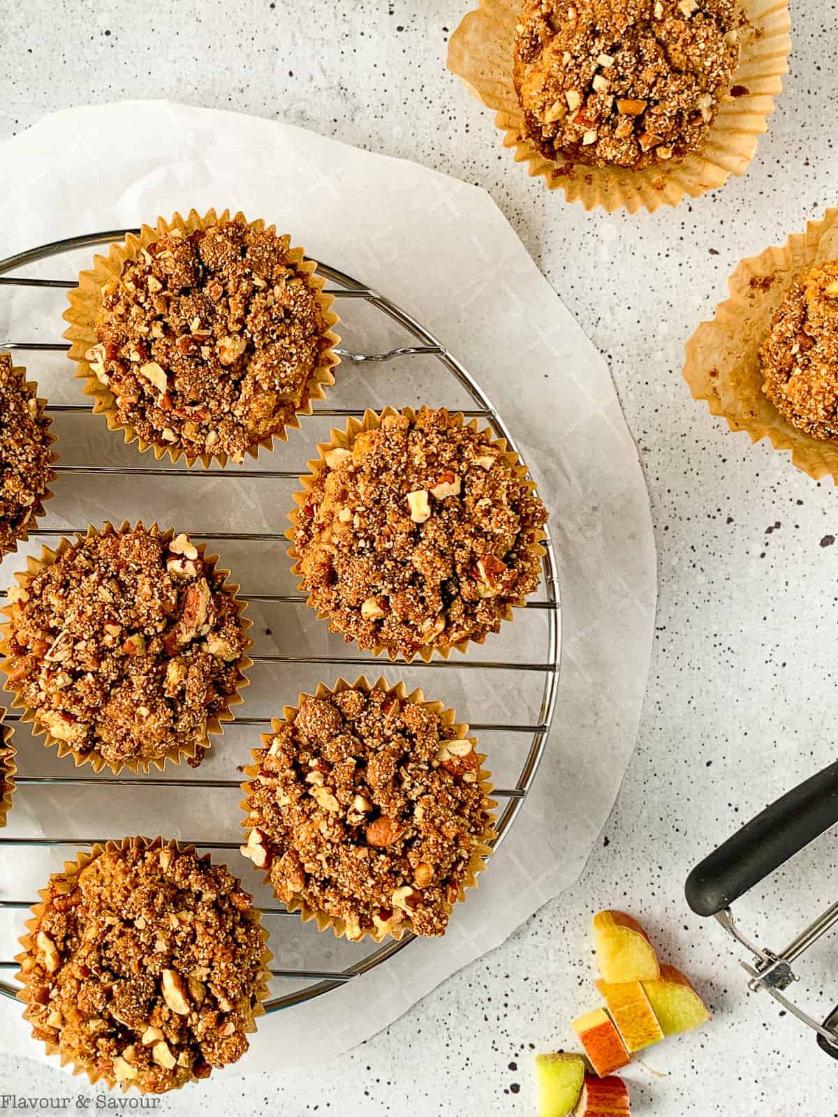 Gluten free rhubarb streusel muffins on a cooling rack