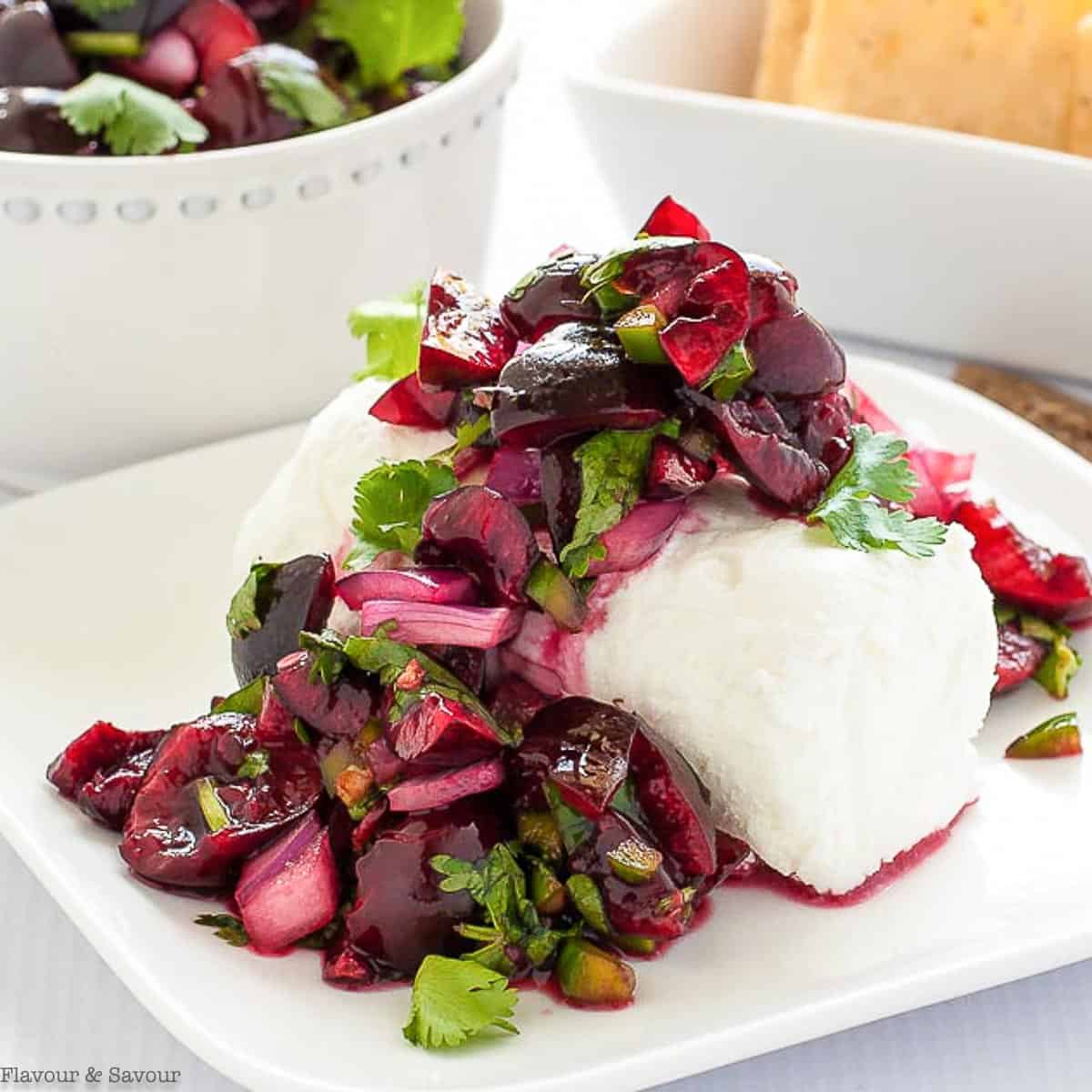 Cherry Salsa with goat cheese and crackers.