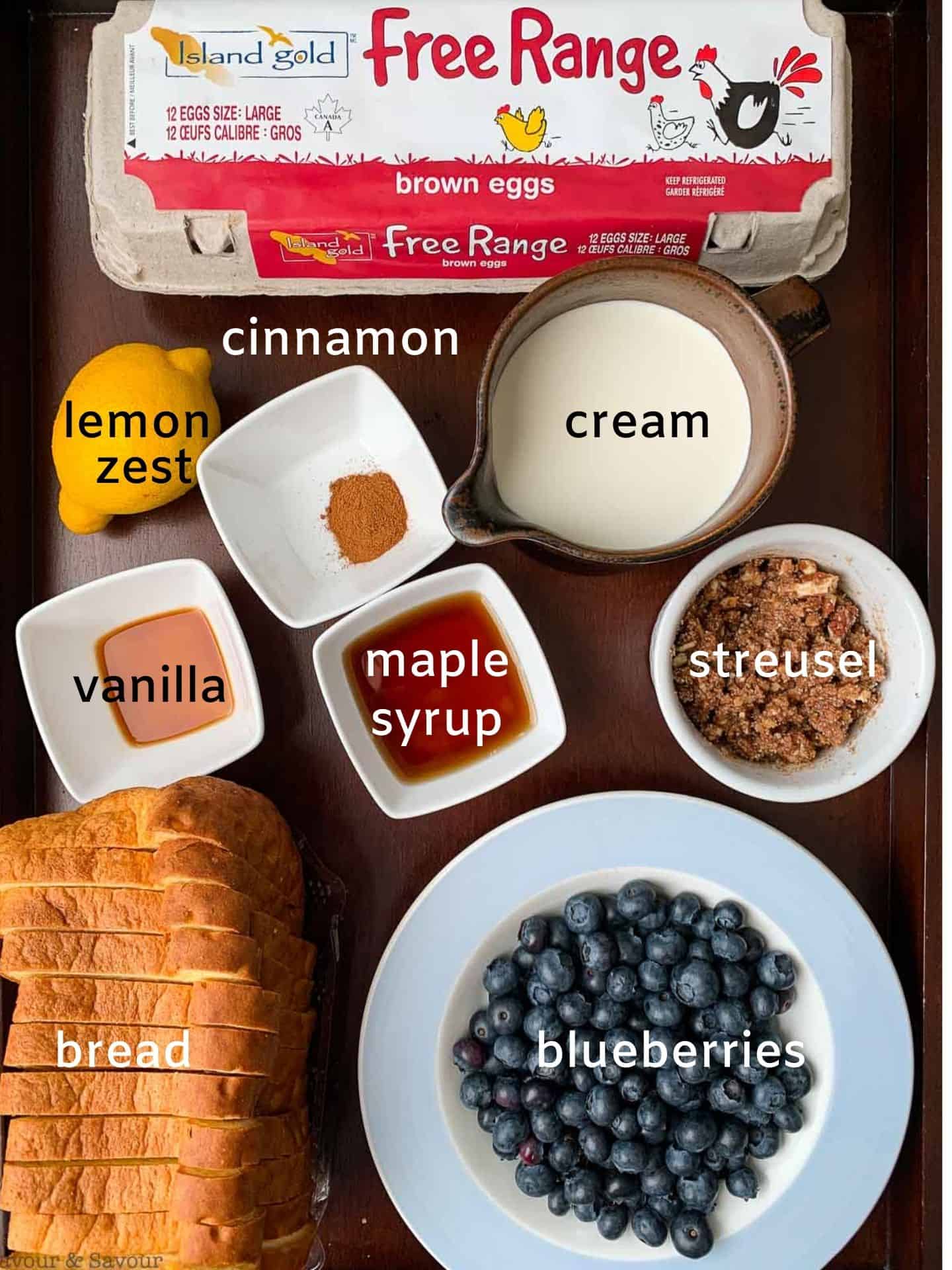 Labeled ingredients for Slow Cooker Blueberry French Toast Casserole