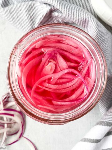 a Mason jar of refrigerator pickled red onions