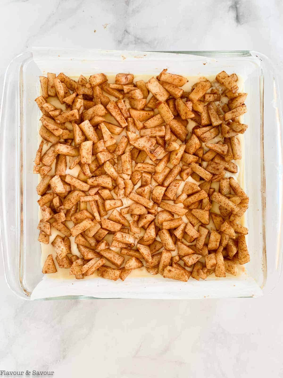 Apple layer for apple cheesecake crumble bars.