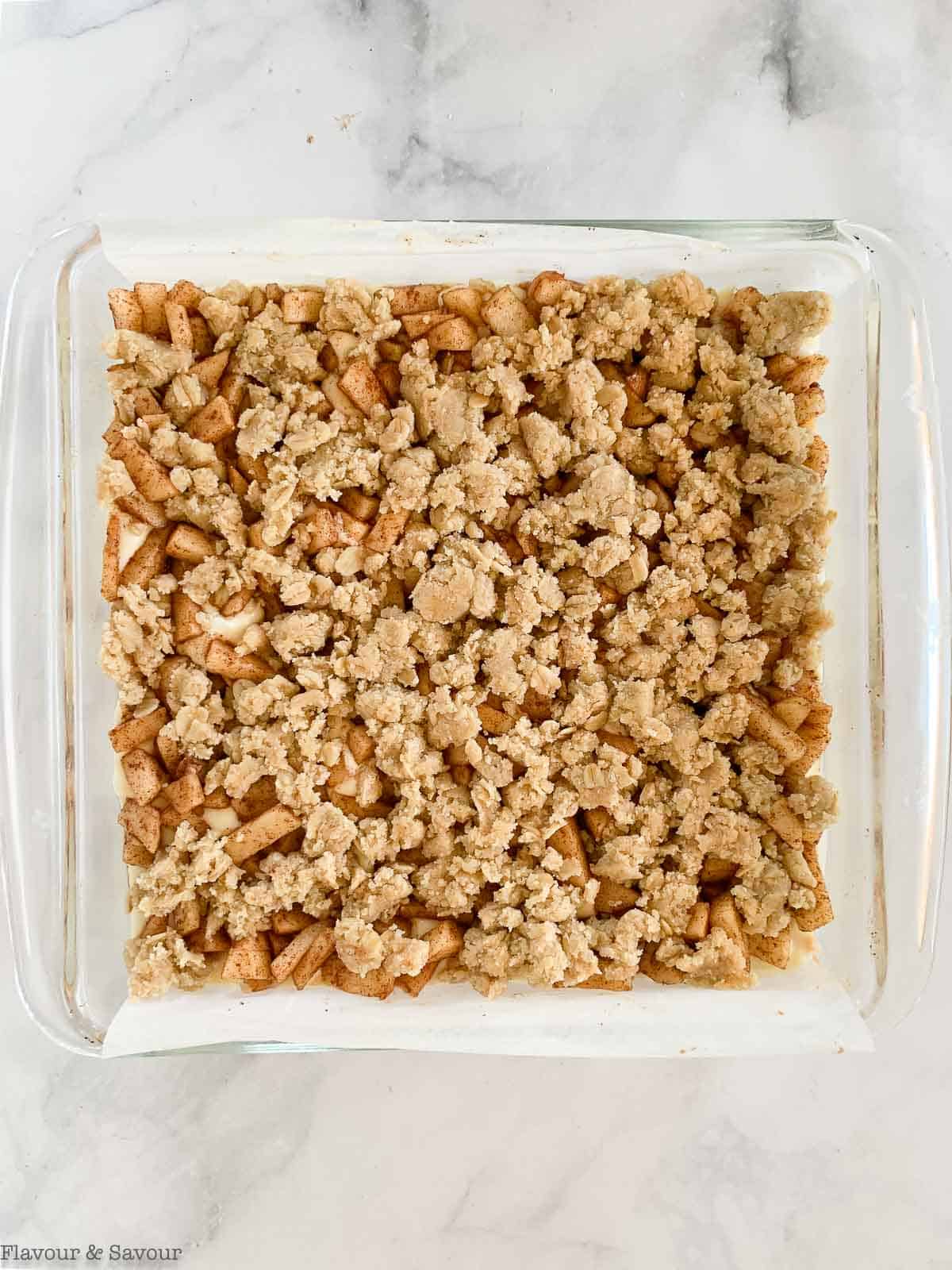 Crumble topping layer for apple cheesecake crumble bars.