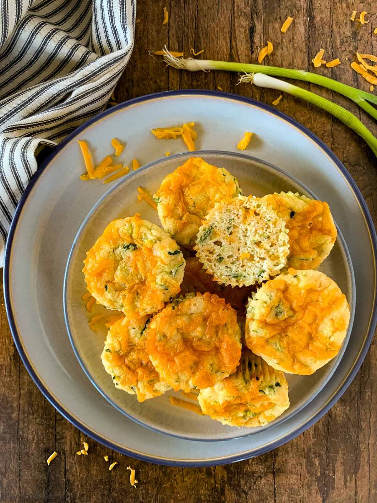 Gluten Free Zucchini Cheddar Muffins on a plate overhead view