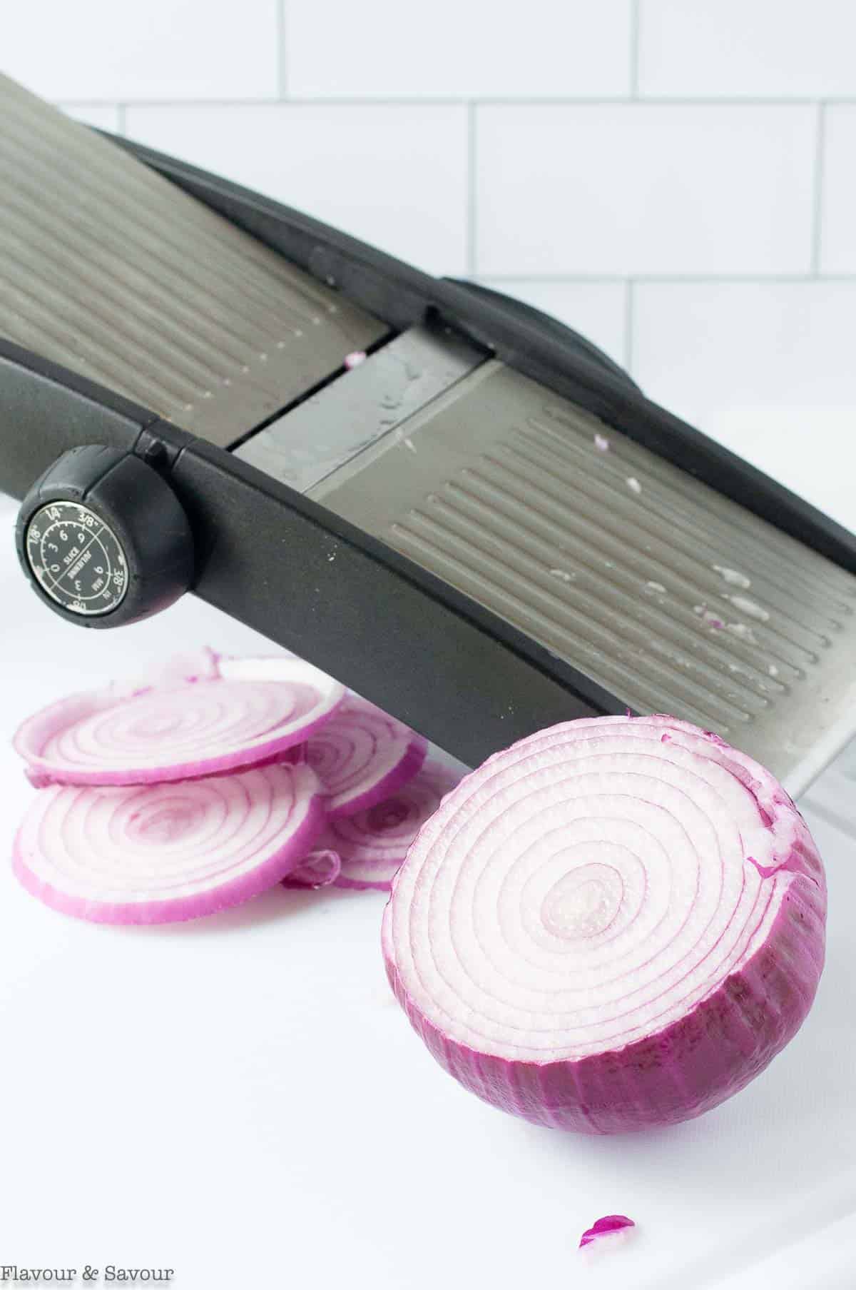 a mandolin slicer for slicing red onions