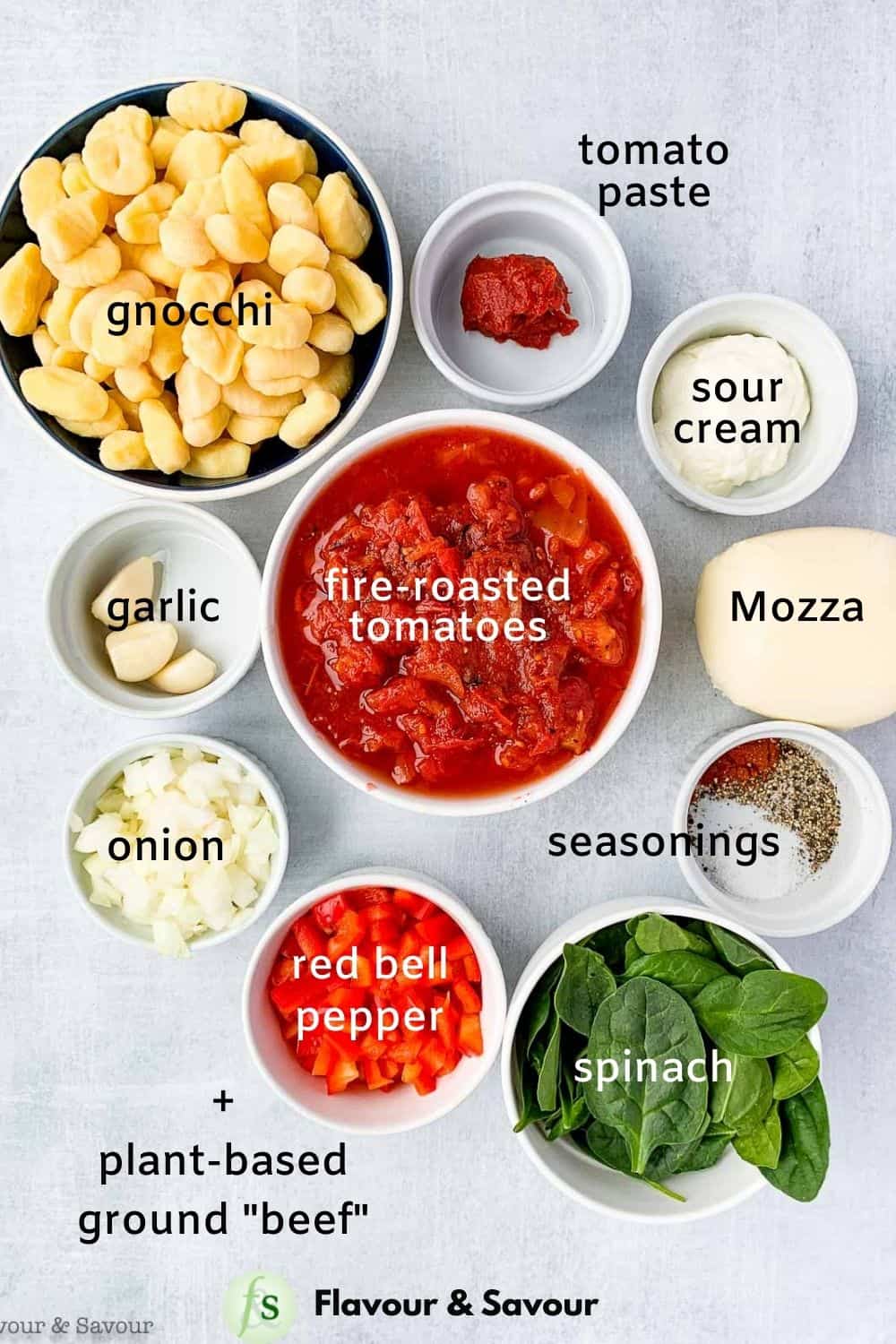 Ingredients with labels for skillet-baked cheese and tomato gnocchi casserole with plant-based ground beef.