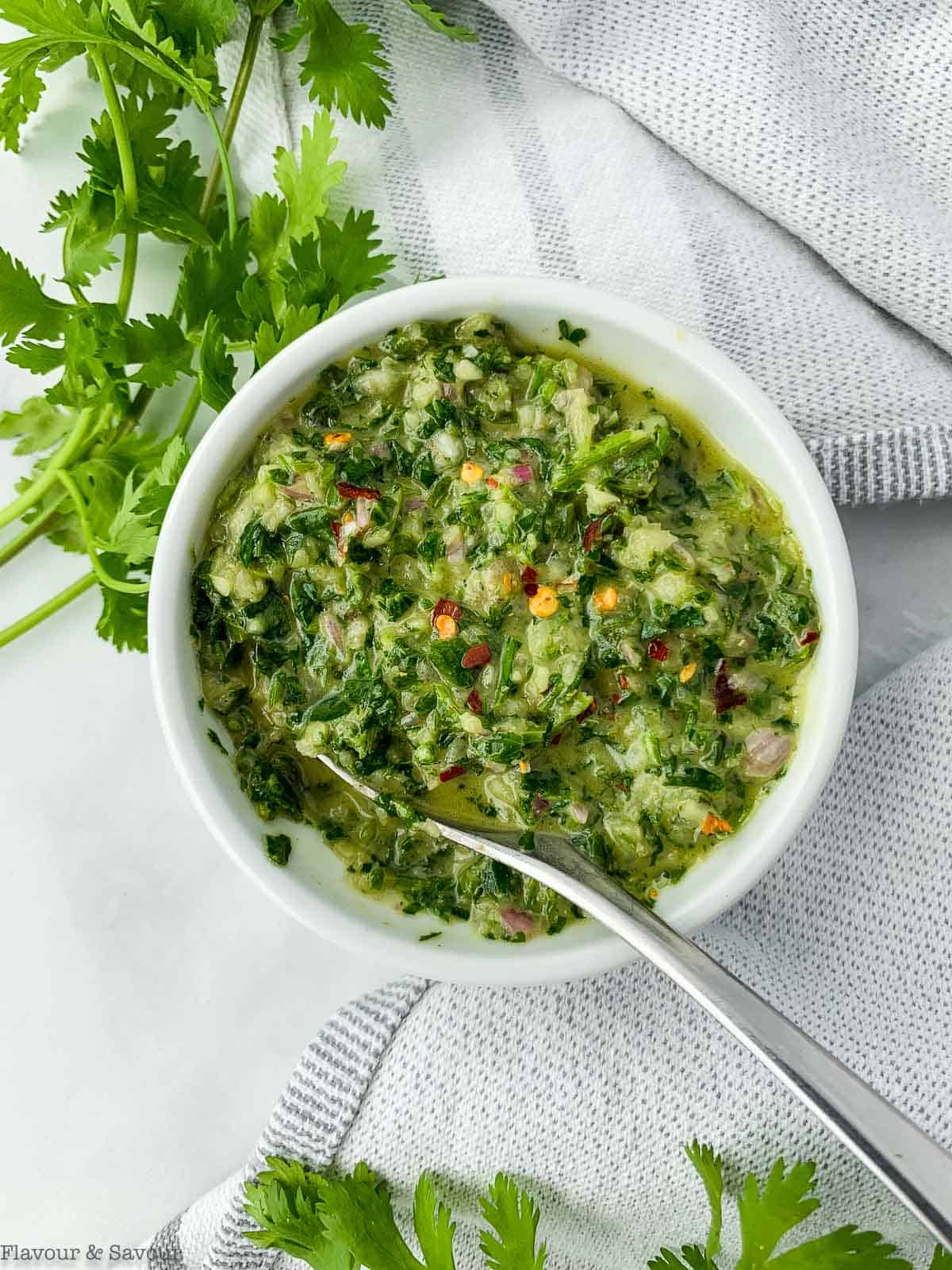 Chimichurri sauce in a round bowl.