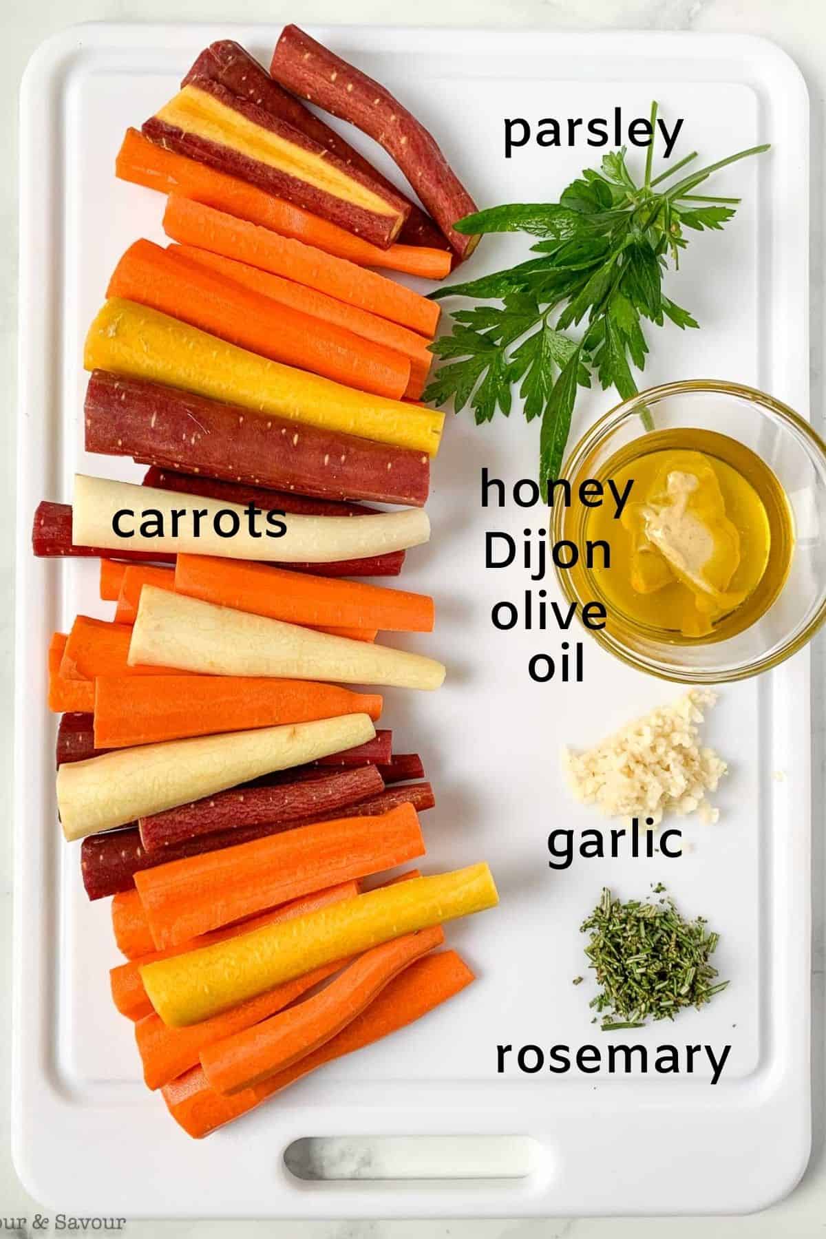 labeled ingredients for roasted carrots with honey mustard glaze
