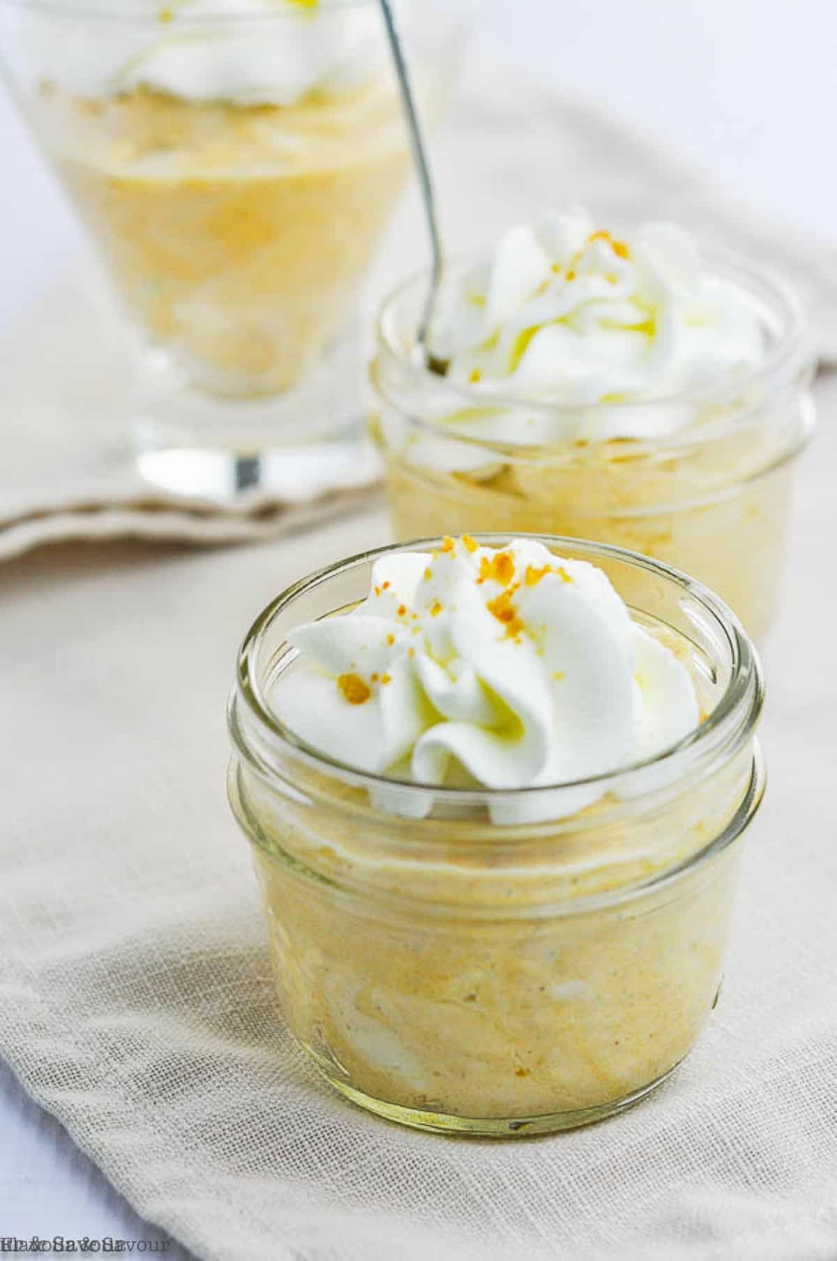 pumpkin cheesecake mousse in small mason jars