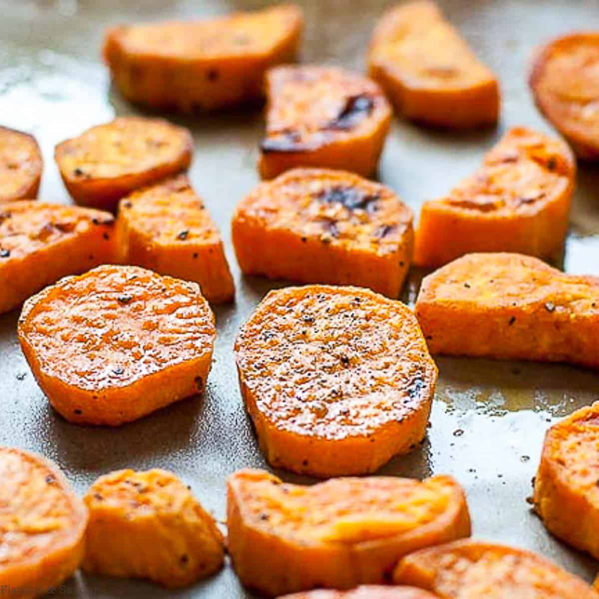 roasted sweet potato rounds on a baking sheet