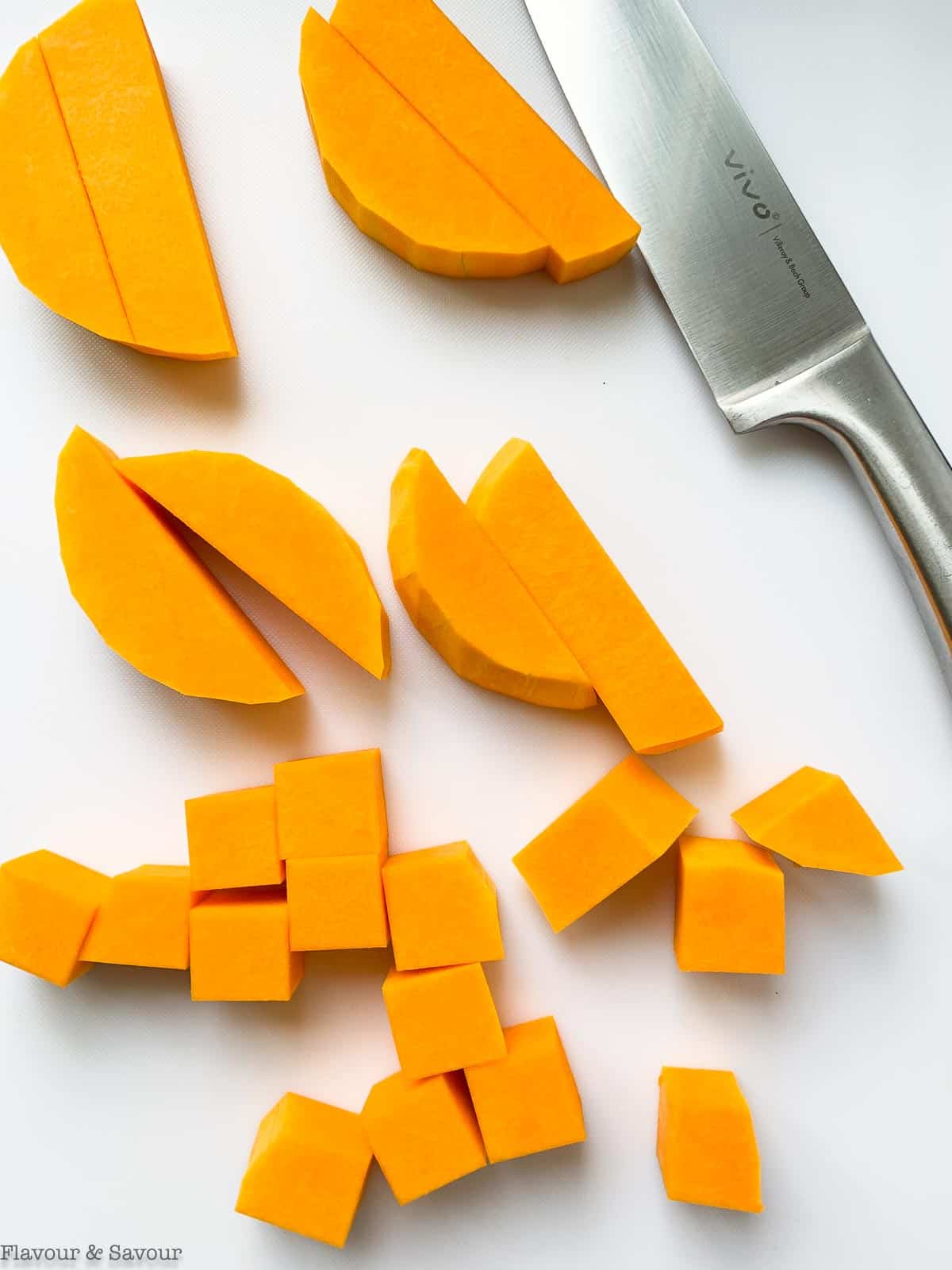 How to cut butternut squash. Step 4, Slice into strips, then cubes.