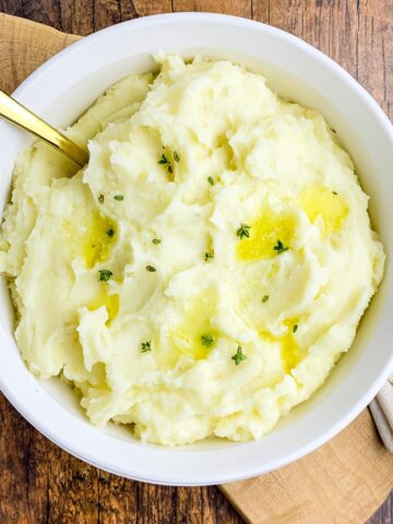 a bowl of instant pot garlic mashed potatoes