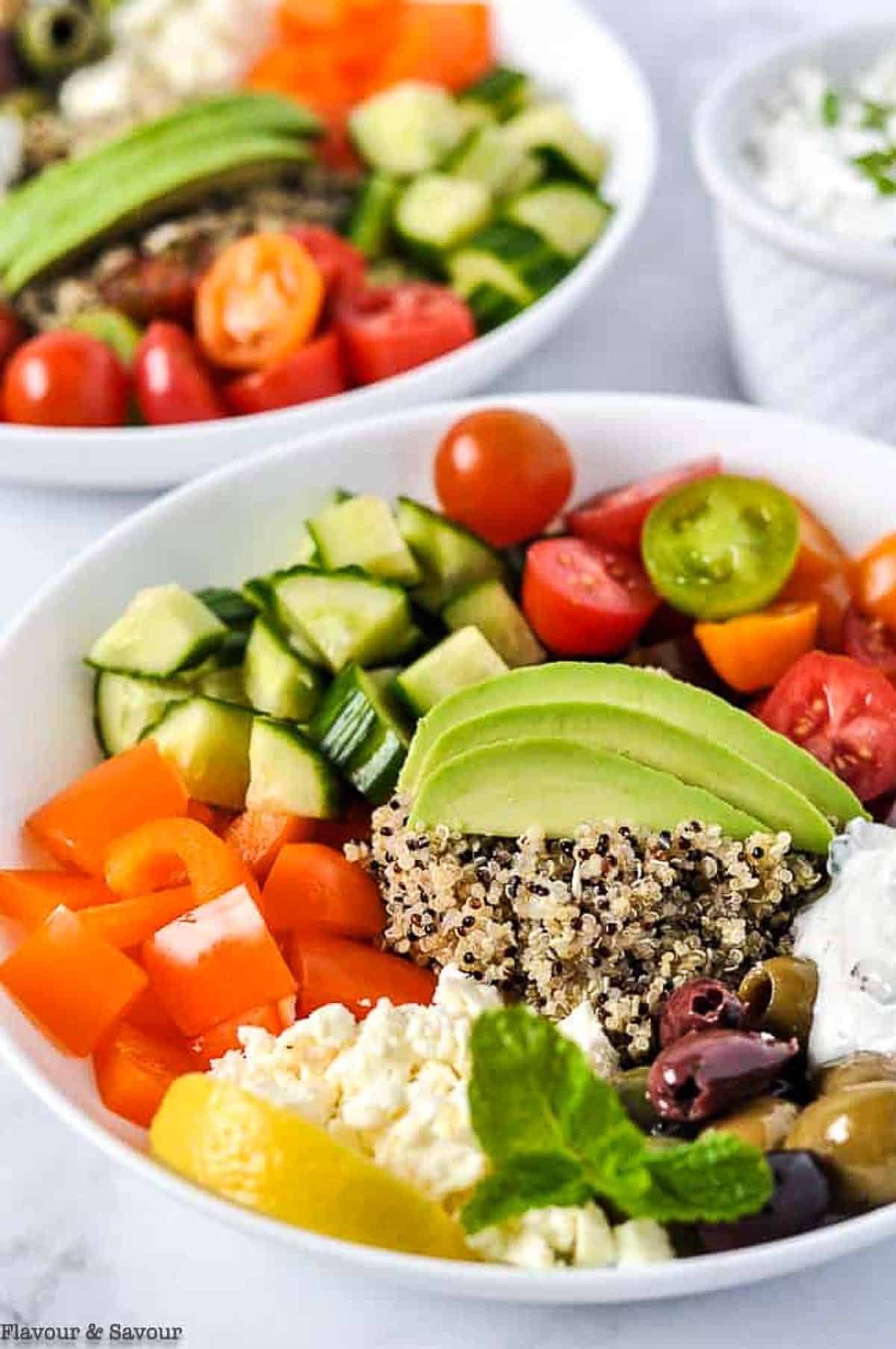 close up view of a vegetarian Mediterranean Quinoa Bowl