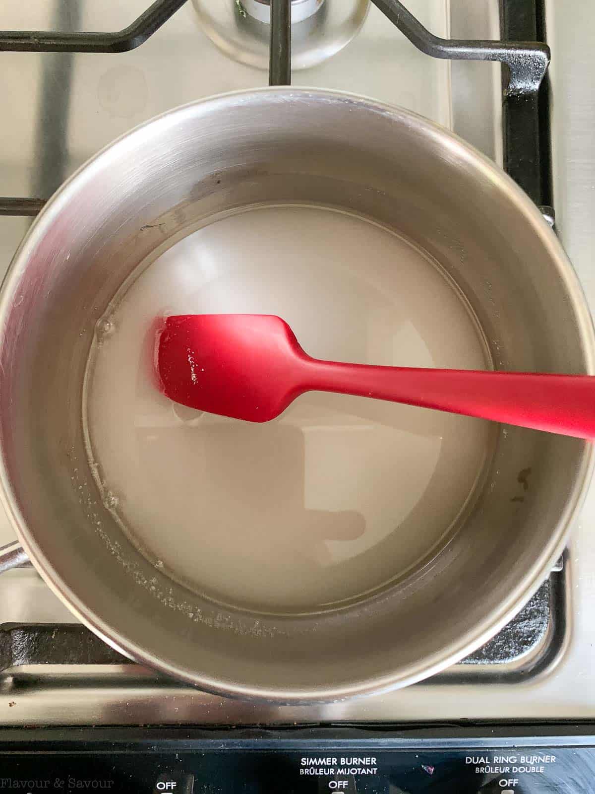 Step 1 to make salted caramel sauce, heat sugar and water.