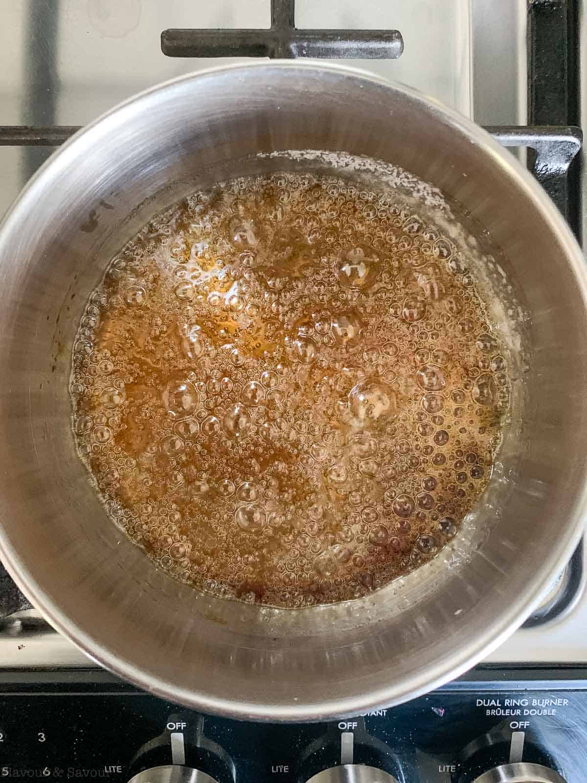 Step 3 to make homemade caramel sauce, boil until it's a deep amber colour.