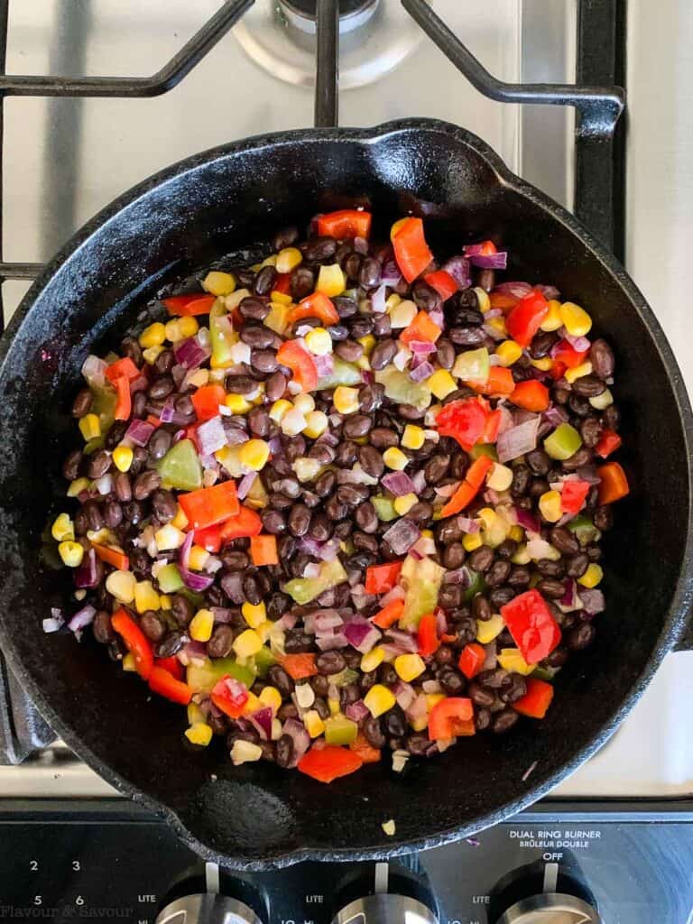 Black beans and corn in a skillet.