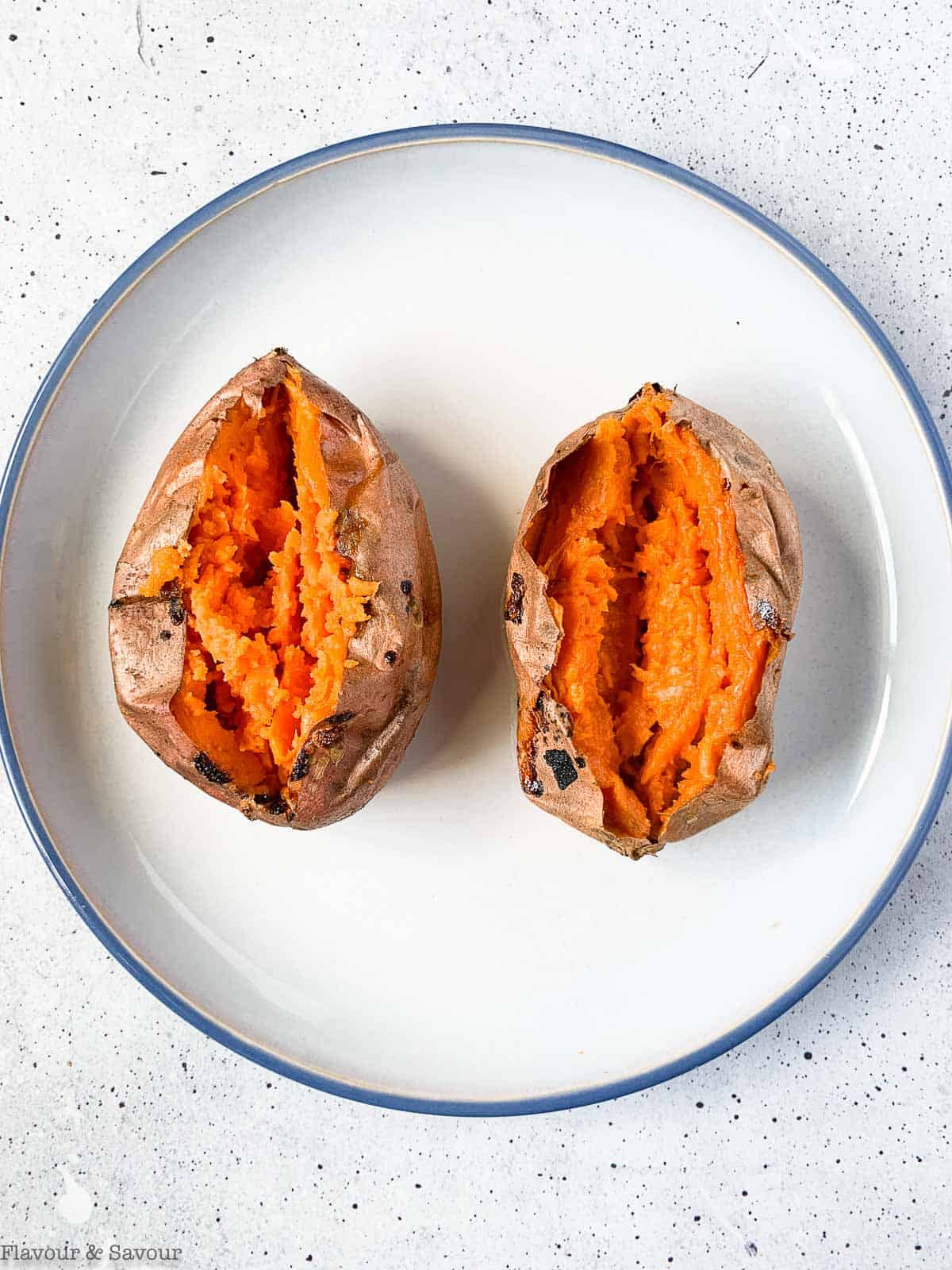 Two baked sweet potatoes.