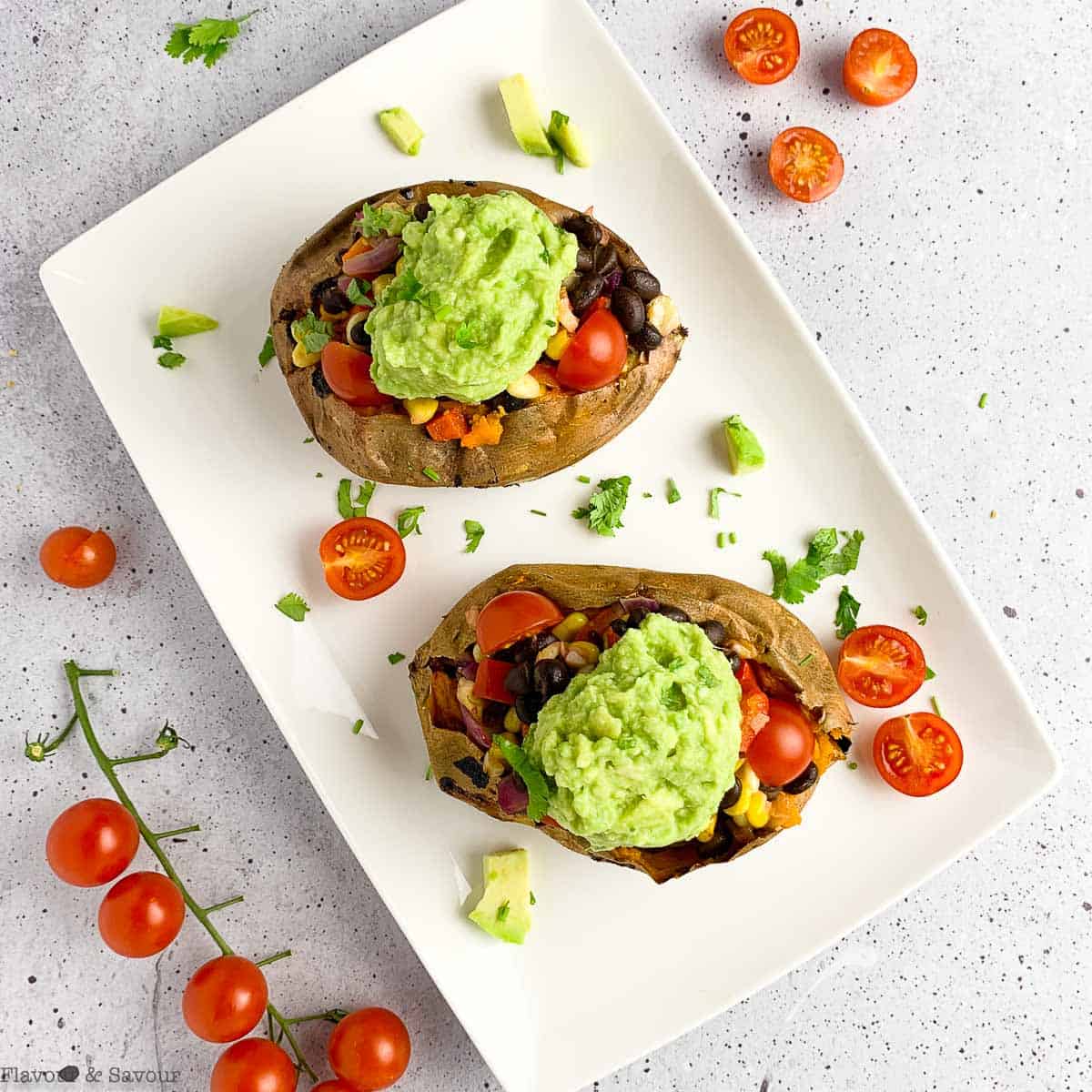 Two stuffed black bean stuffed sweet potatoes.