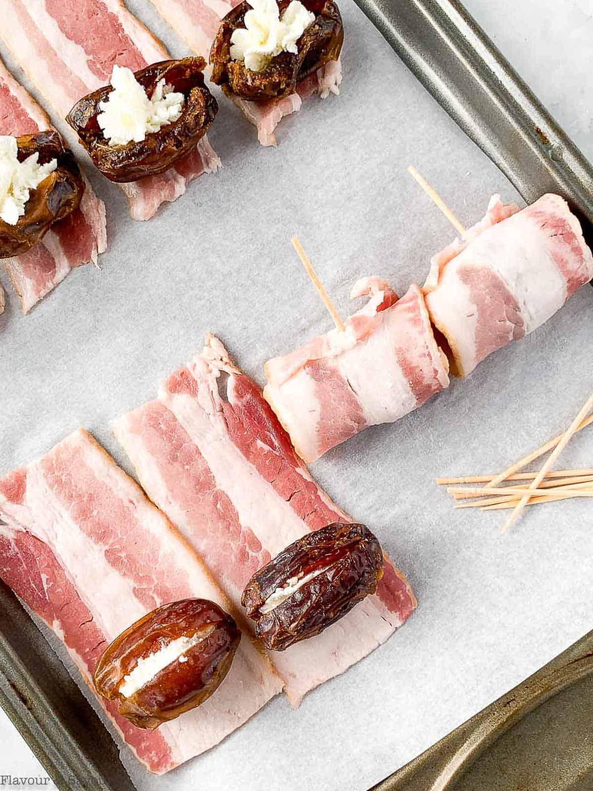 wrapping stuffed Medjool dates with bacon