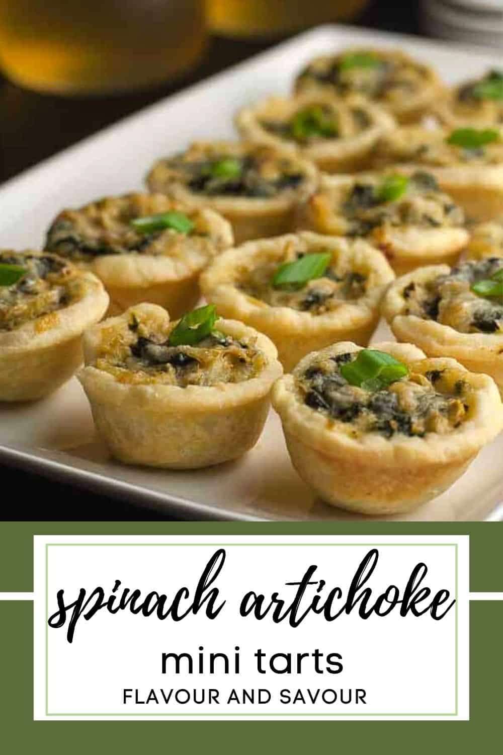 image with text overlay for mini spinach artichoke tarts