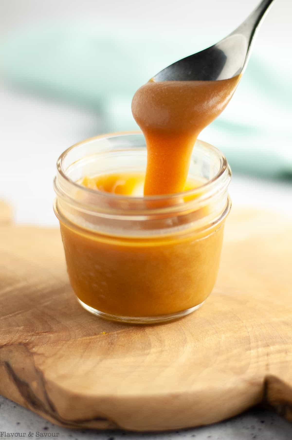 a spoonful of salted caramel bourbon sauce
