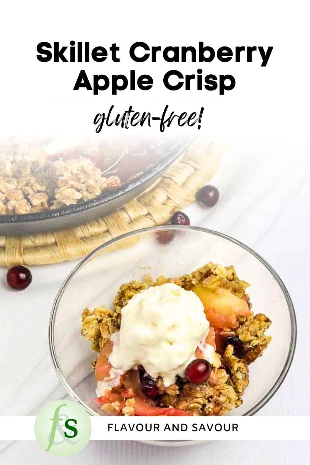 Image with text overlay for skillet apple cranberry crisp.