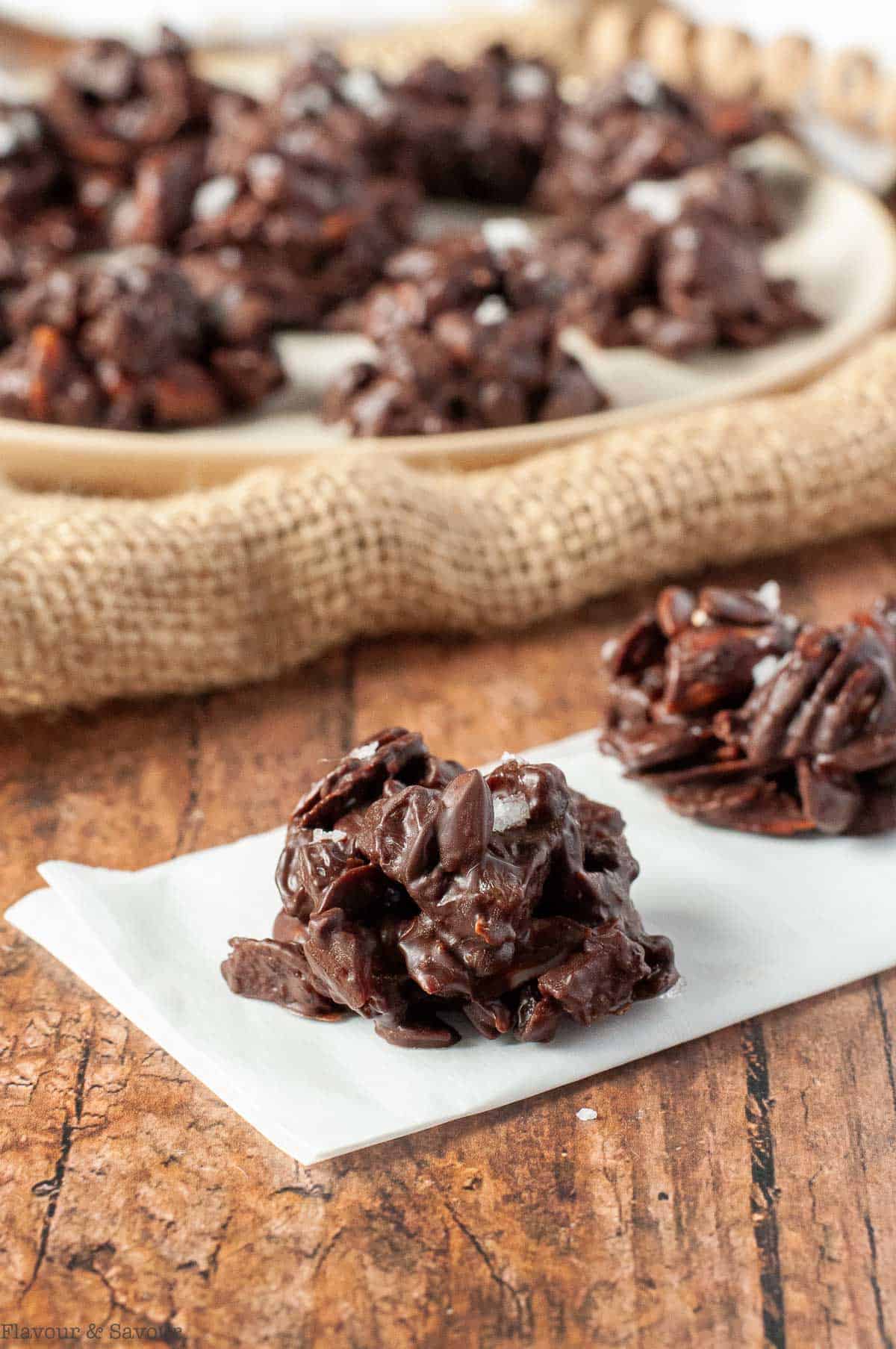 Trail mix chocolate nut clusters with dried fruit.