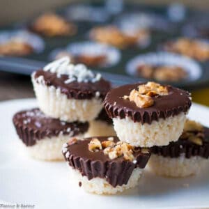 chocolate coconut cups stacked on a plate