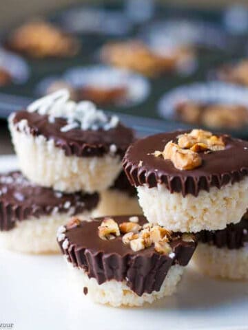 chocolate coconut cups stacked on a plate