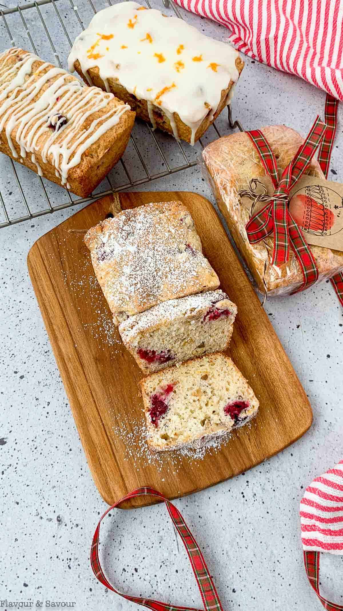 Cranberry orange bread loaves wrapped for hostess gifts.