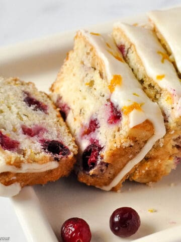 slices of glazed cranberry orange bread