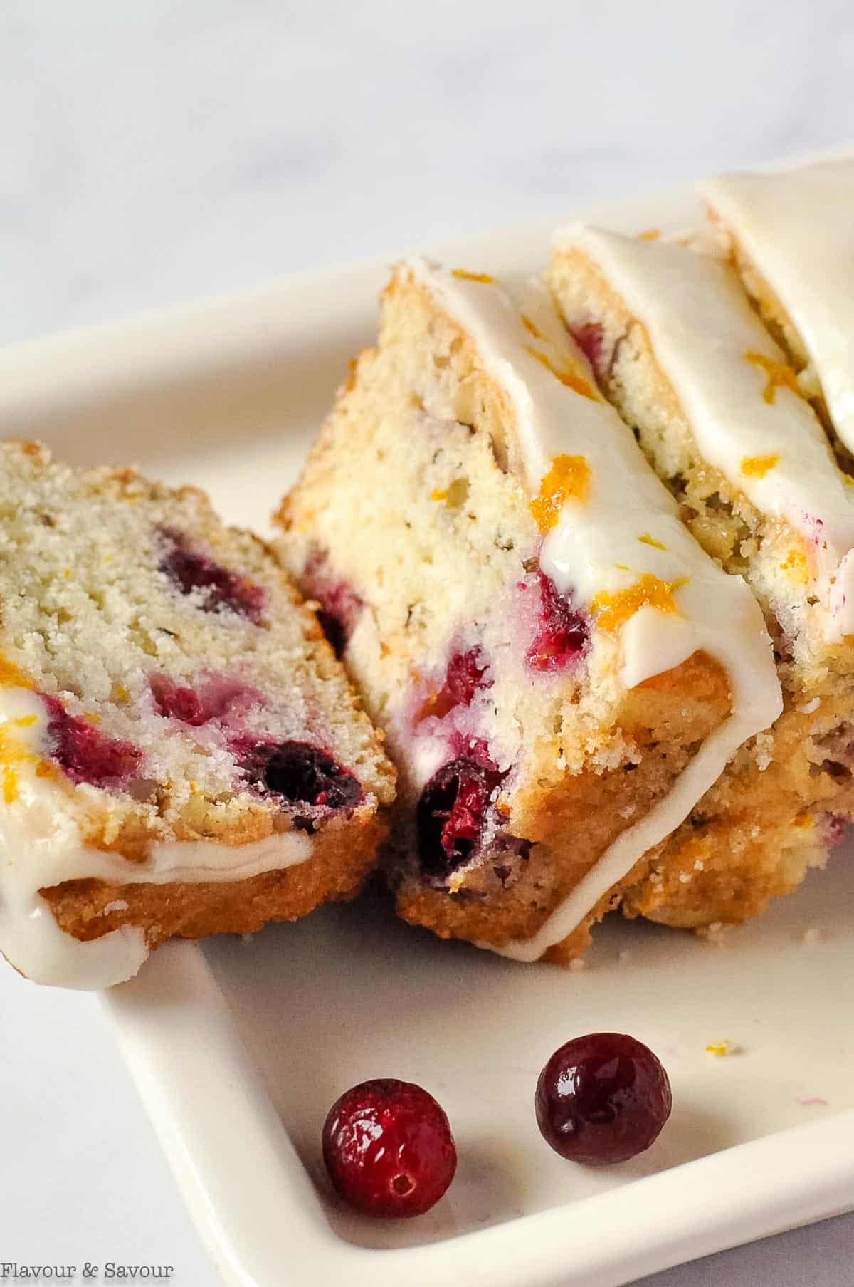 slices of glazed cranberry orange bread