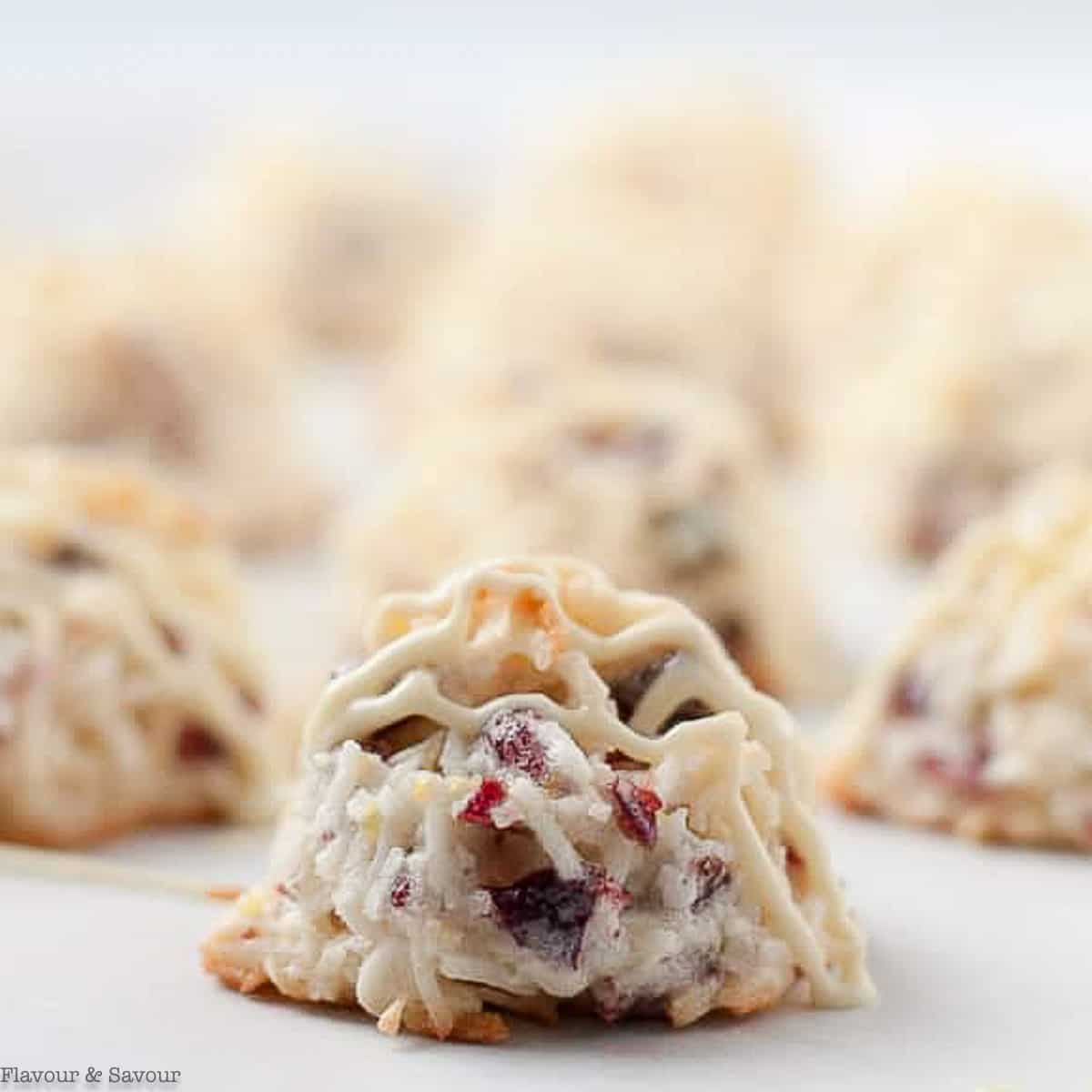 close up view of a single white chocolate macaroon