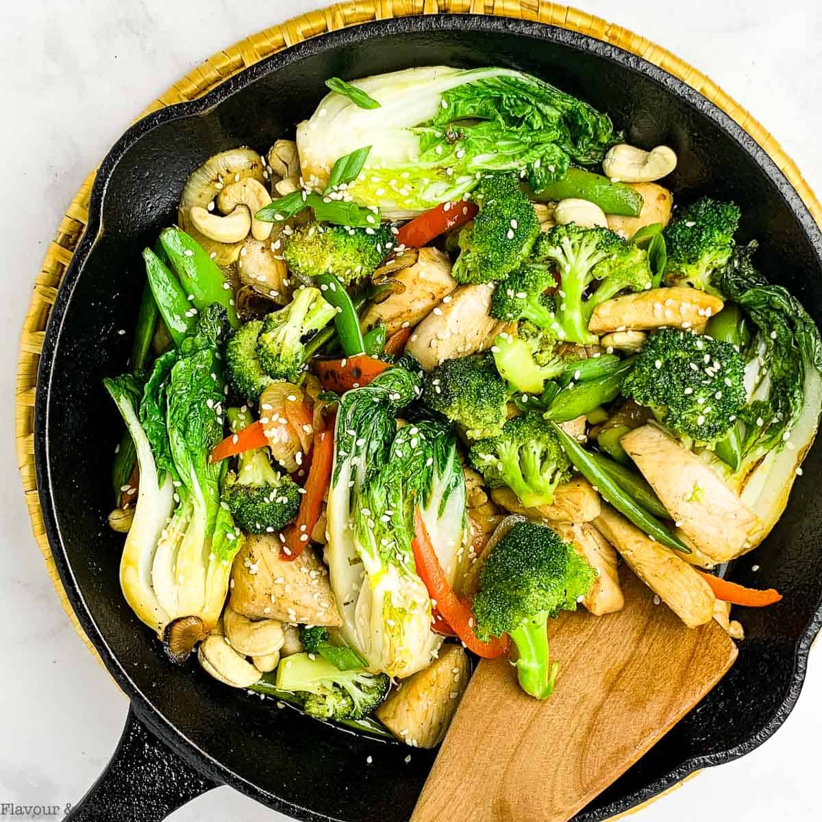 Teriyaki stir fry with bok choy, broccoli, peppers peas and chicken.