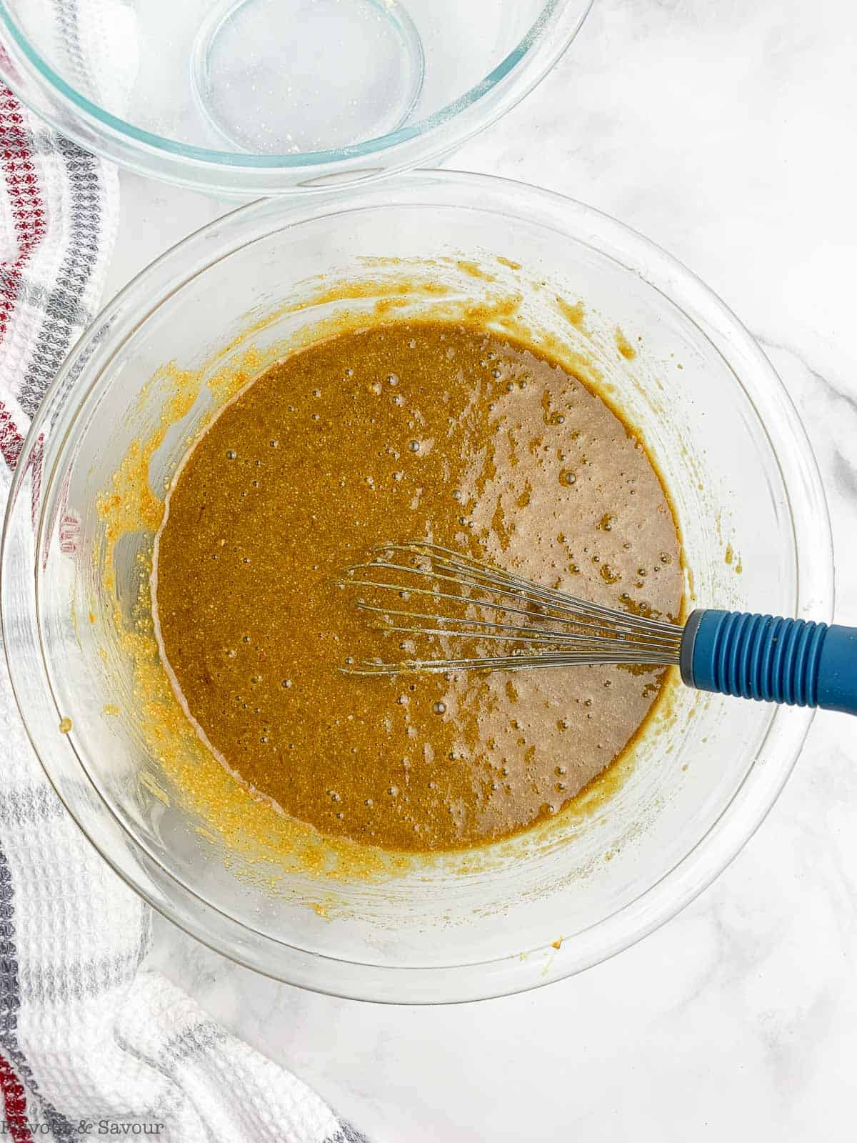 Combined dry and wet ingredients for gingerbread cake.