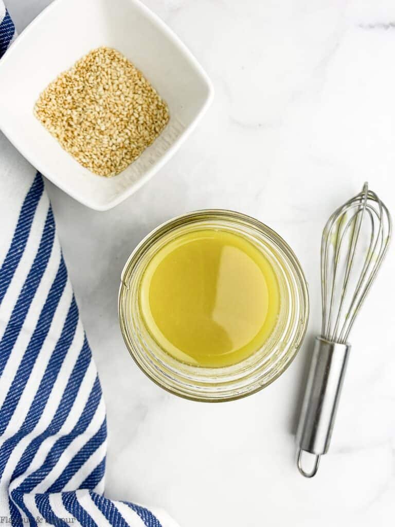 Whisking sesame miso dressing ingredients together.