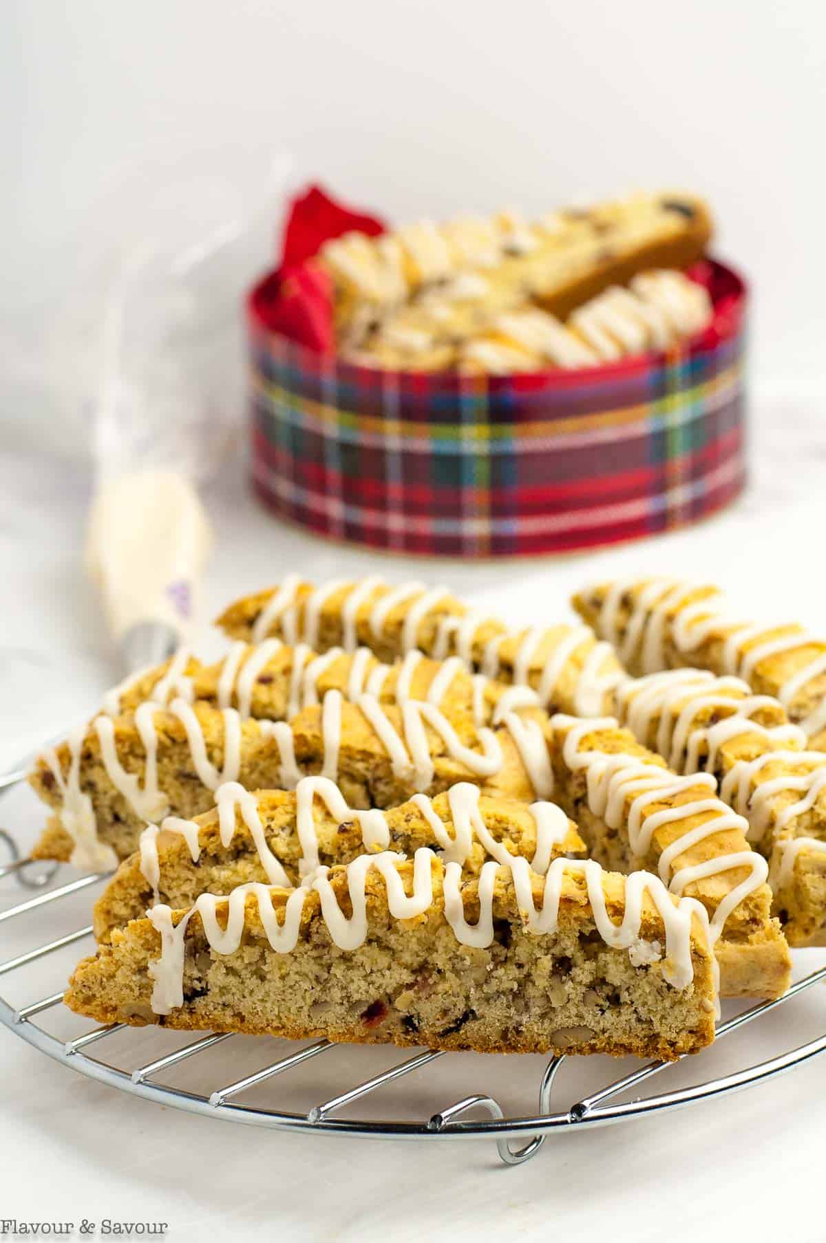 a fresh batch of cranberry pecan biscotti with lemon glaze