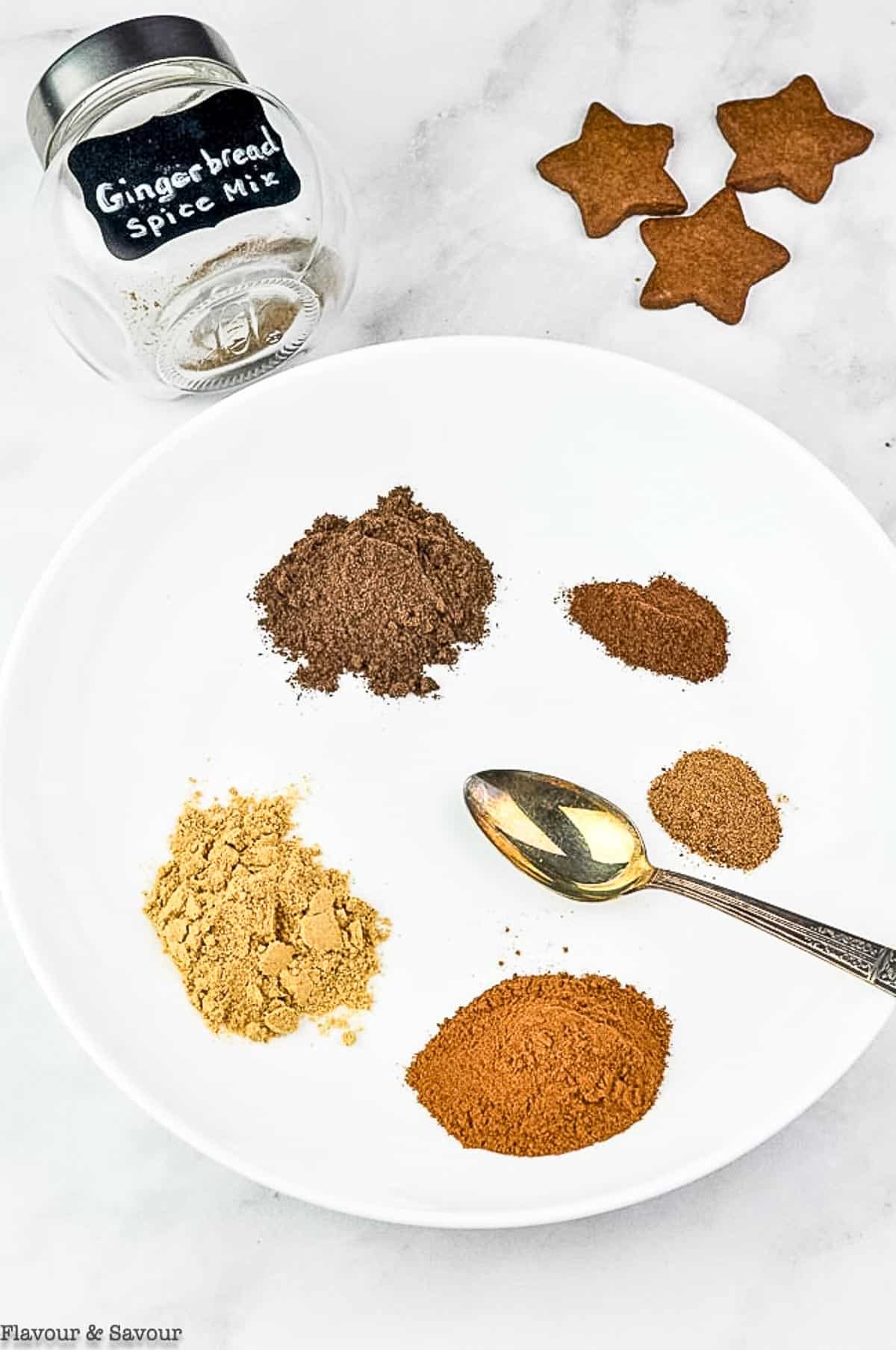 measured mounds of spices to make gingerbread spice mix