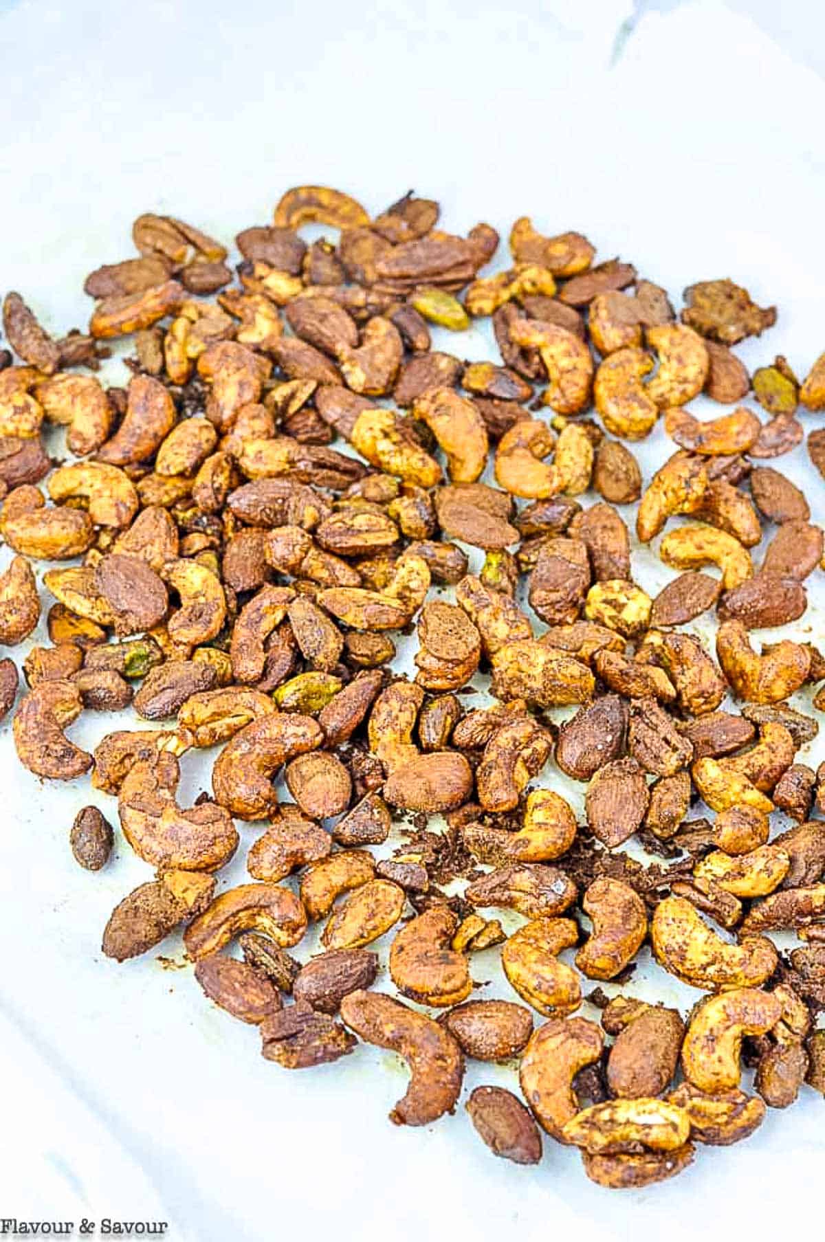 gingerbread spiced nuts on a baking sheet