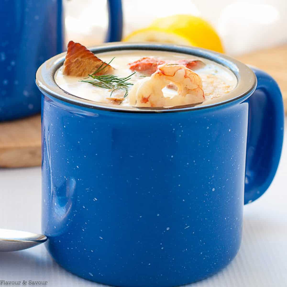 a mug full of seafood chowder