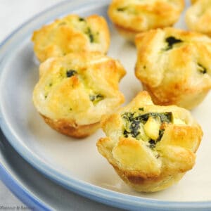 spinach artichoke pastry puffs on a plate