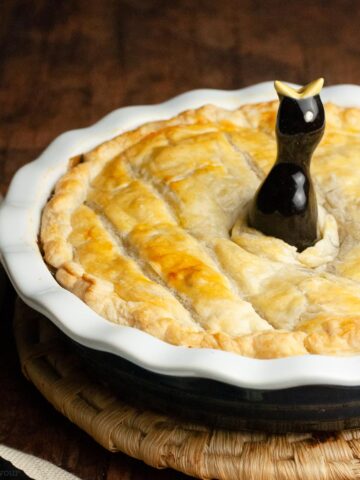 a baked vegetarian pot pie with a pie bird