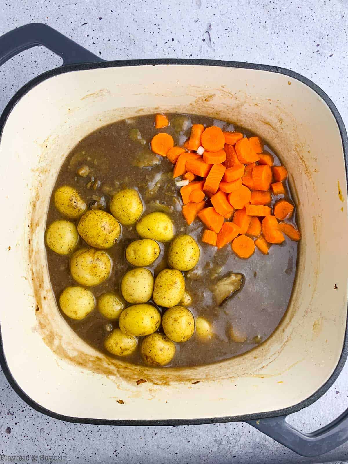 potatoes and carrots cooking for vegetarian pot pie