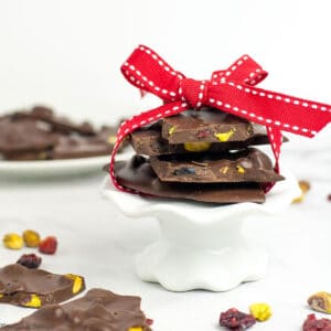 Cranberry Pistachio Chocolate Bark tied with a red ribbon